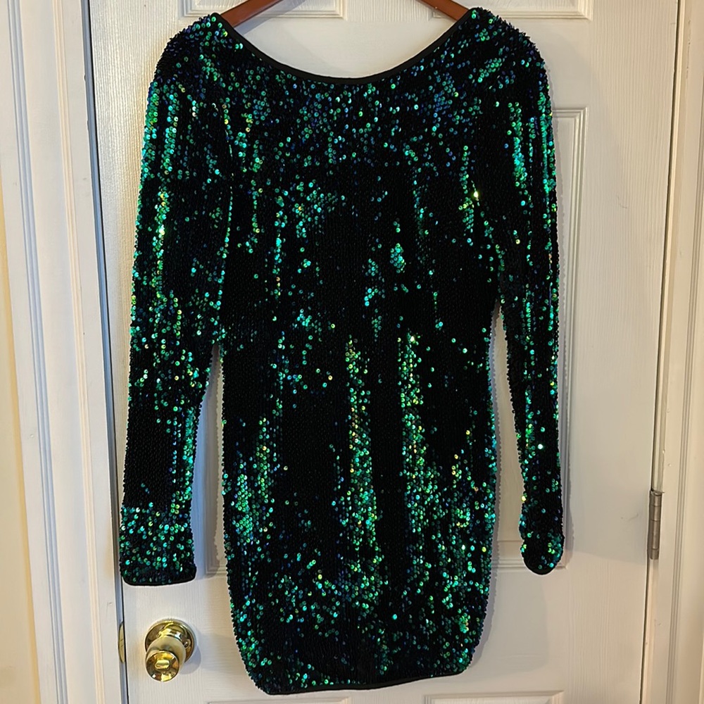 Green sequenced cocktail dress, stretch material.
